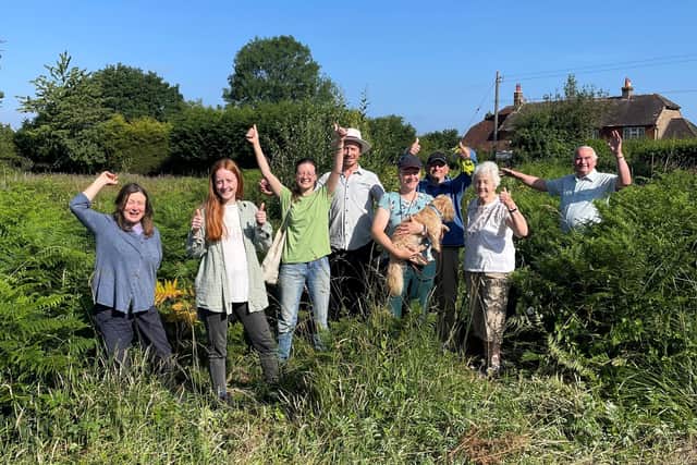 Campaigners from the Chailey Commons Society celebrate at one of the proposed substation sites