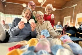 Pam and friends knit love for premature babies. Singing joy, stitching warmth.