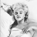 Marilyn Monroe resting between takes during a photographic studio session in Hollywood, for the making of the film The Misfits, 1960. © Eve Arnold Estate