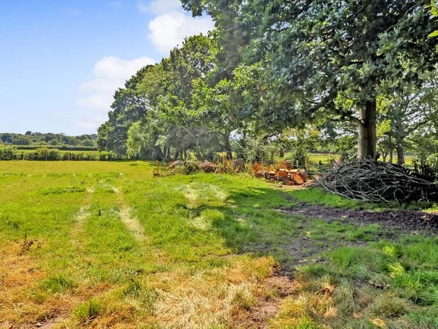 This five bed converted barn in Anmore Road, Denmead is on the market for £1.4m. It is listed on Zoopla by White & Guard Estate Agents.