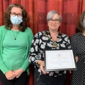Previous winners: Angmering Parish Council chair Nikki Hamilton-Street, centre, presents the Fred Rowley Community Award to Angmering Medical Centre staff and vaccination centre volunteers in September 2021