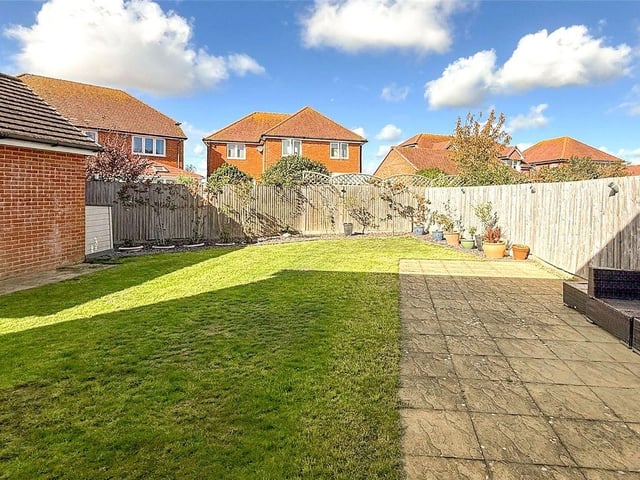 There are attractive gardens and off-road parking, including a garage