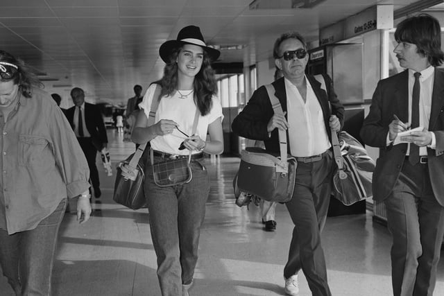 American actress and fashion model Brooke Shields at Heathrow Airport, London, UK, 16th July 1984. (Photo by Daily Express/Hulton Archive/Getty Images)