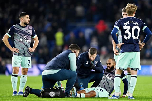 Bryan Mbeumo suffered a concerning-looking injury as Brentford were beaten 2-1 by Brighton. (Photo by Mike Hewitt/Getty Images)