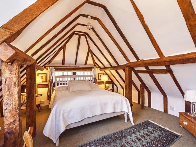 On the first floor is a superb principal bedroom, plus two further bedrooms