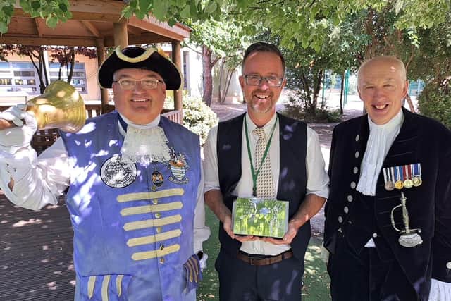 Oak Grove College head teacher Phillip Potter with Worthing town crier Bob Smytherman and High Sheriff of West Sussex Andy Bliss. Picture: David Nicholls