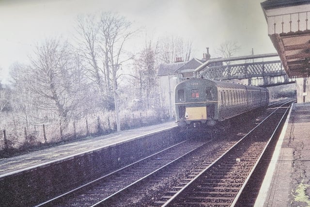 A diesel passenger train leaving Bramber for the short trip northwards to Steyning