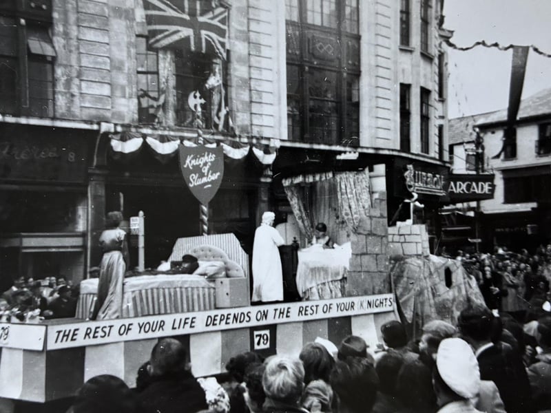 Jones & Tomlin's Knights of Slumber carnival float travelling along Worthing seafront