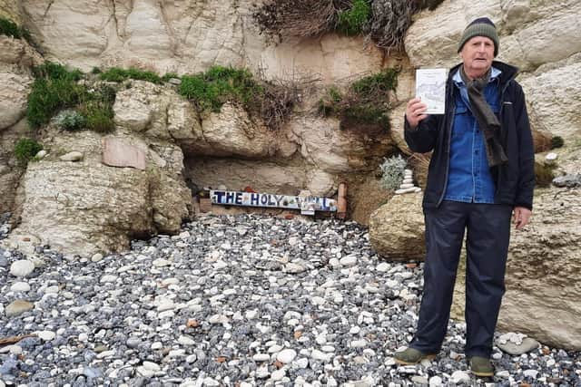 Holywell buried under beach thrown pebbles