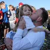 Billy Wood with daughter Berite after Hastings United won the Isthmian south east title a year ago