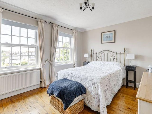 The main bedroom spans the width of the property