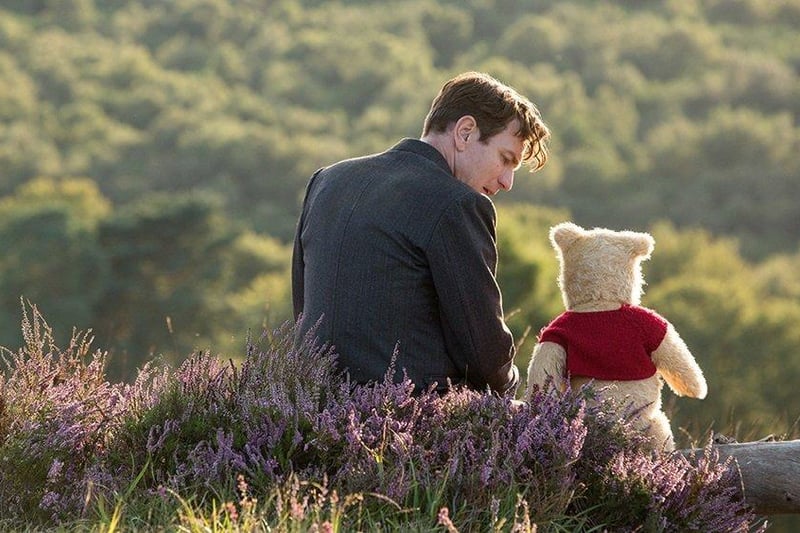 Christopher Robin (Ewan McGregor) with his long time friend Winnie the Pooh in Disney's live-action adventure Christopher Robin, 2018.
Ashdown Forest and the Bluebell Railway both feature in the Disney film.