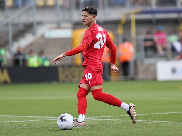 Action from Worthing's 3-0 win at Torquay United which put them top of National League South