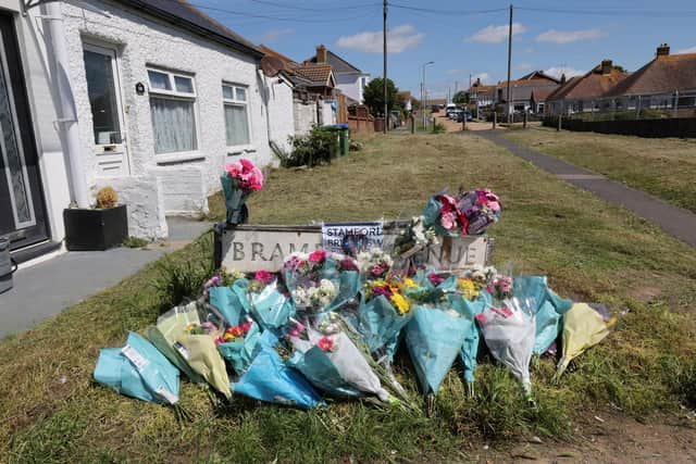 FLOWERS and pictures have reportedly been removed from a memorial of a man killed after he was hit by a police car.