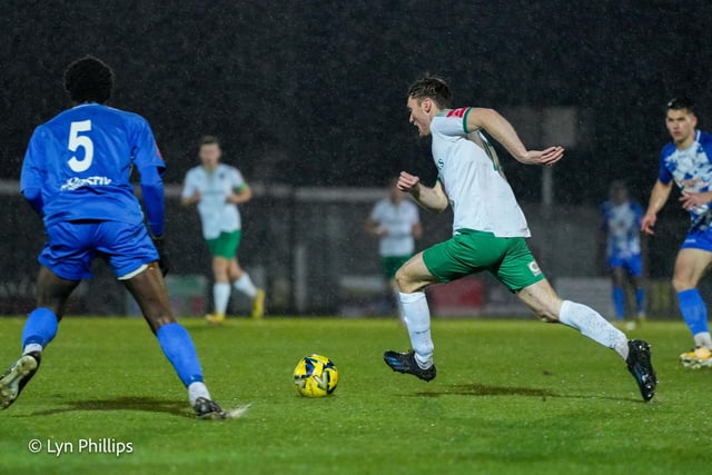 Action fron the Rocks' 2-2 draw with Wingate and Finchley at rainy Nyewood Lane