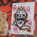 Luis Alvas. ‘Posters and stickers on 6th Street, Pueblo, Mexico (saying “I won’t shut up, James.’)’.