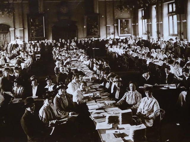 Volunteers handing out ration cards at the Town Hall in February 1918