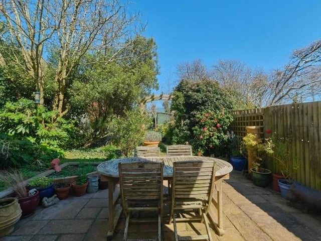 The variety of seating areas include a patio seating area adjoining the rear of the house, decked seating area adjoining the pond and further circular patio which serves as a real sun trap. The remainder of the garden has a vast array of trees, shrubs and flowers and central lawn area with stepping stone path leading to the shed and greenhouse.