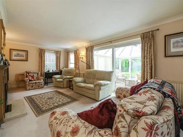 The living room leads into the conservatory, meaning there's plenty of natural light to enjoy