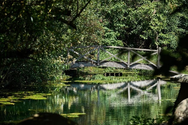 The property's mill pond also has a wonderful bridge
