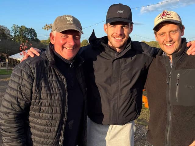 Arsenal and England footballer Declan Rice pictured with Tulleys owners Stuart and Sam Beare. Photo: Tulleys Farm