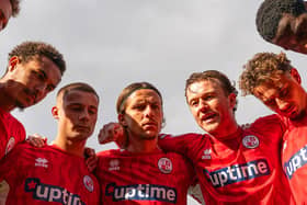 Crawley Town captain Jude Arthurs leads a huddle before their 2-2 draw with Chesterfield at the Broadfield Stadium on Saturday, October 10. Photo: CTFC