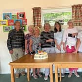 Long-standing members of Comptons Tennis Club cut the 60th birthday cake | Picture supplied by Comptons Tennis Club