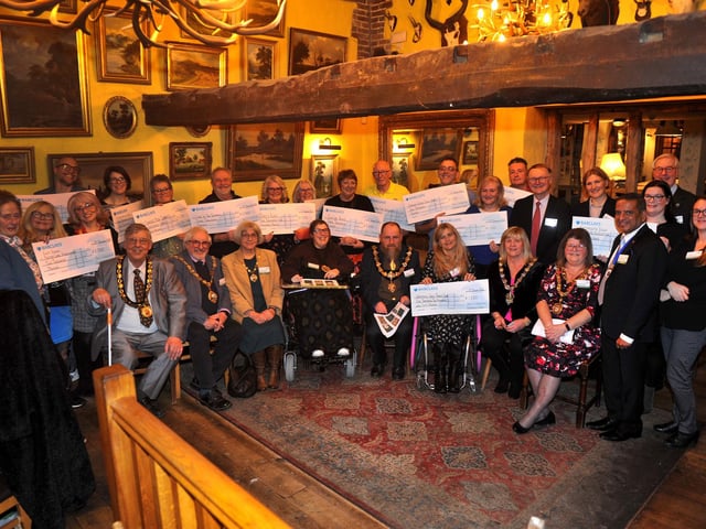 Worthy winners of the 2023 Hall & Woodhouse Community Chest Awards with judges and dignitaries at the awards evening at The World's End in Patching on Friday, January 12