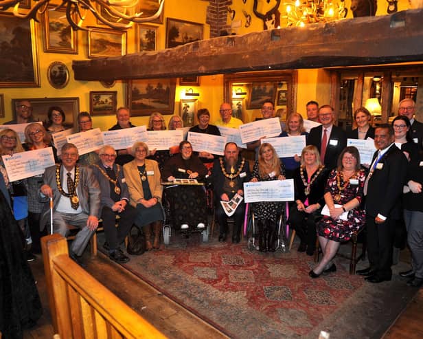 Worthy winners of the 2023 Hall & Woodhouse Community Chest Awards with judges and dignitaries at the awards evening at The World's End in Patching on Friday, January 12