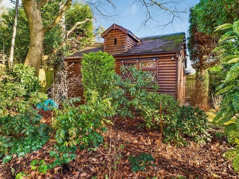 The garden offers an insulated log cabin