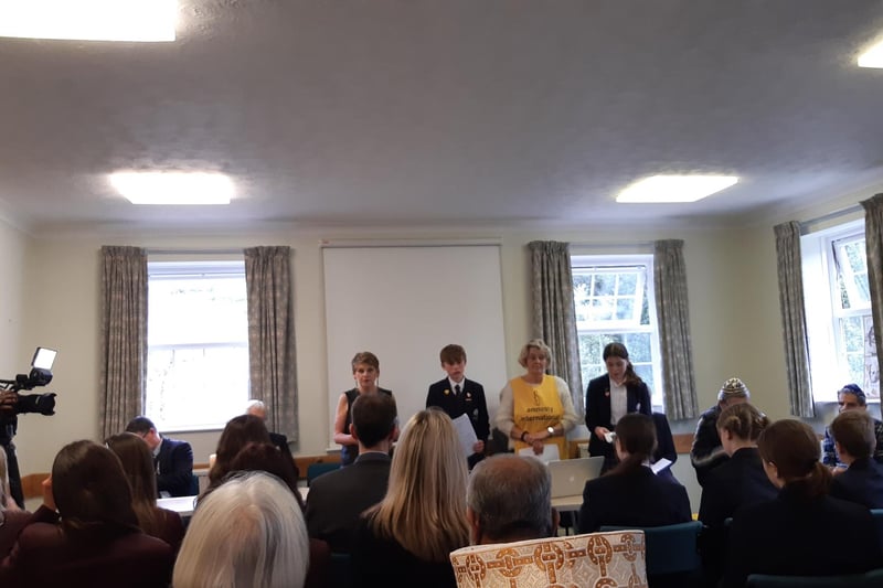 Haywards Heath's Holocaust Memorial Day service started at 2pm with councillors, Amnesty International representatives and religious representatives in attendance.