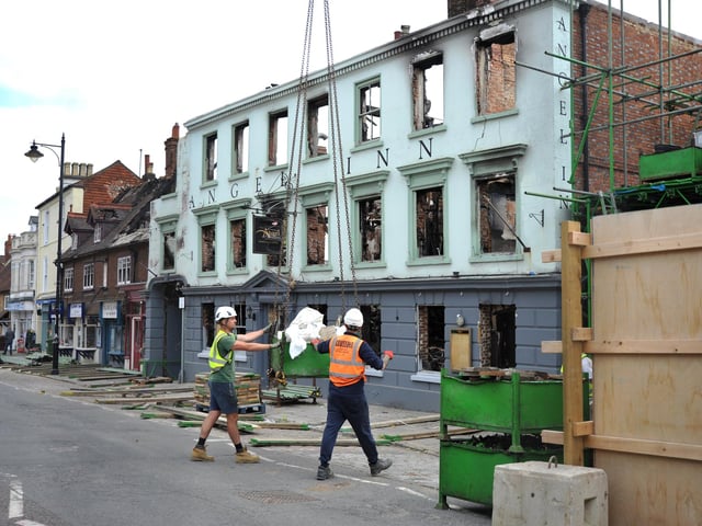 Scaffolding work has started on the Angel Inn in Midhurst. Pic S Robards SR2305311