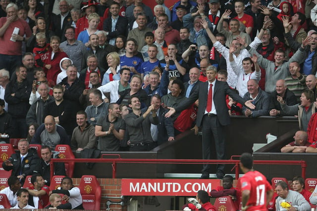 The Arsenal legend's best teams were aggressive and strong-willed on the pitch, an energy that was matched by their manager on the sideline. 
There are few more iconic images then Arsene being sent to the Old Trafford stands in 2009 after angrily kicking a water bottle down the touchline. (Photo by Tom Purslow/Manchester United via Getty Images)