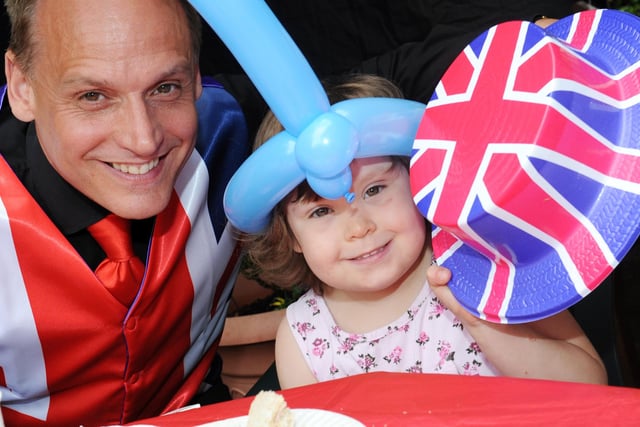 Diamond Jubilee party at Suzanne Green Day Centre, Horsham. Marco the Magician with Bethany Carter,4