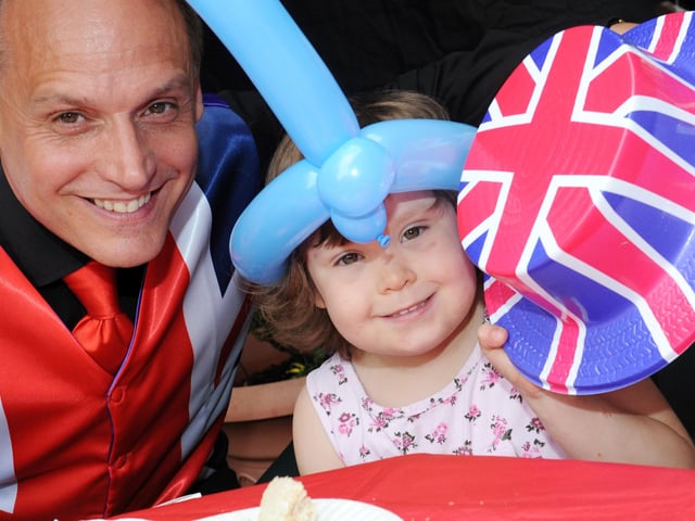 Diamond Jubilee party at Suzanne Green Day Centre, Horsham. Marco the Magician with Bethany Carter,4