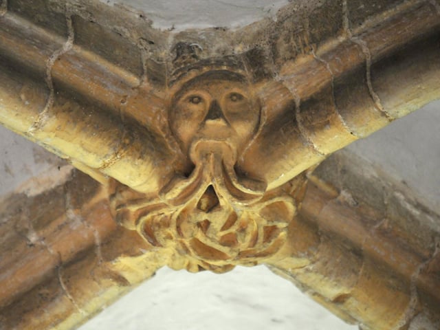 A Green Man in the aisle vaults of the south aisle