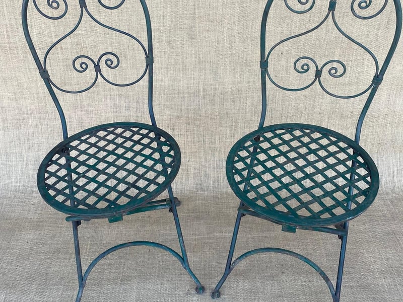 A pair of early 20th century folding iron chairs, probably French, £1,600 the pair from Garden Artefacts