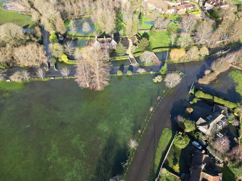 Flooding at Pook Lane and Sheepwash Lane, East Lavant after the River Lavant burst its banks