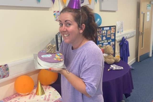 Rachel celebrating with a 21st Birthday Cake