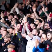 Crawley fans - pictured at the home match with Bradford - will have been unimpressed with their side's showing at Swindon | Picture: Eva Gilbert