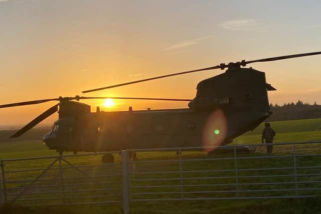A Royal Air Force Chinook helicopter landed and took off again following an incident on a field north of Arundel, as it conducted a series of flypasts across the South of England for Remembrance Sunday commemorations. Photo: Mark Sheene