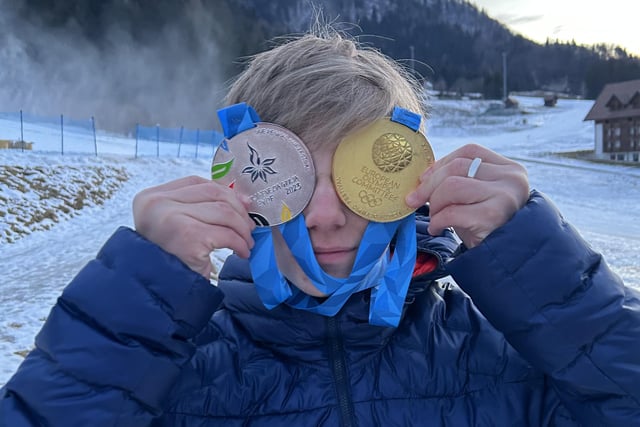 Charlie Lane with his gold and silver medals