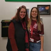 Hayley Clout of Hastings United (left) with hospital radio presenter Abi Olorenshaw
