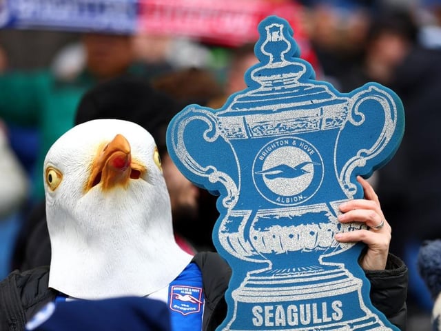 BRIGHTON, ENGLAND - JANUARY 29: Brighton & Hove Albion fans show their support with seagull masks and a tin foil FA Cup trophy prior to the Emirates FA Cup Fourth Round match between Brighton & Hove Albion and Liverpool FC at Amex Stadium on January 29, 2023 in Brighton, England. (Photo by Bryn Lennon/Getty Images)