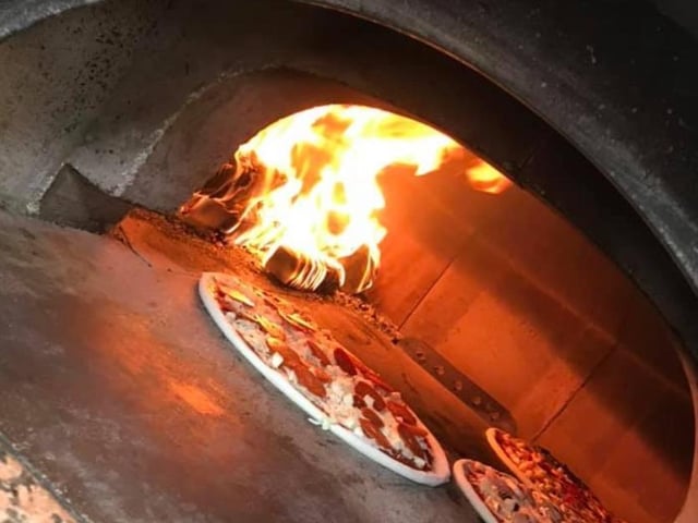 Pizza Shed at Waldegrave Street, in Hastings town centre, has a large wood fire over and offers a great selection of pizzas, including vegetarian and vegan pizzas and a 'super hot' pizza with scotch bonnet sauce.