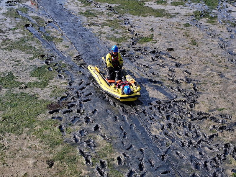 Both agencies worked together to rescue casualties from mud.