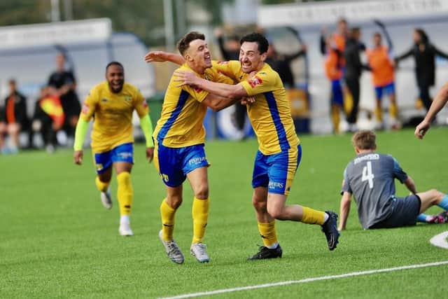 Lancing - pictured here celebrating a goal against Three Bridges earlier in the season - are having a fine run of form which continued with a 4-3 win at Ashford | Picture: Stephwn Goodger