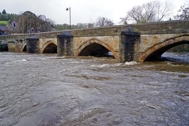 Flood warnings are in place across the River Derwent's catchment area. The river flows close to Matlock town centre.