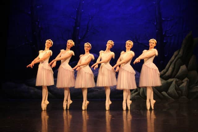 Caitlin Waldron is abseiling down the Spinnaker Tower for charity. Last month she appeared in English Youth Ballet's production of Swan Lake at the Kings Theatre in Southsea and is pictured here, second left. 