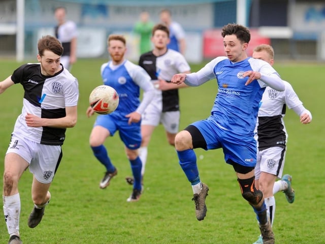 Action from Shoreham's 1-0 win over East Preston at Middle Road in division one of the SCFL